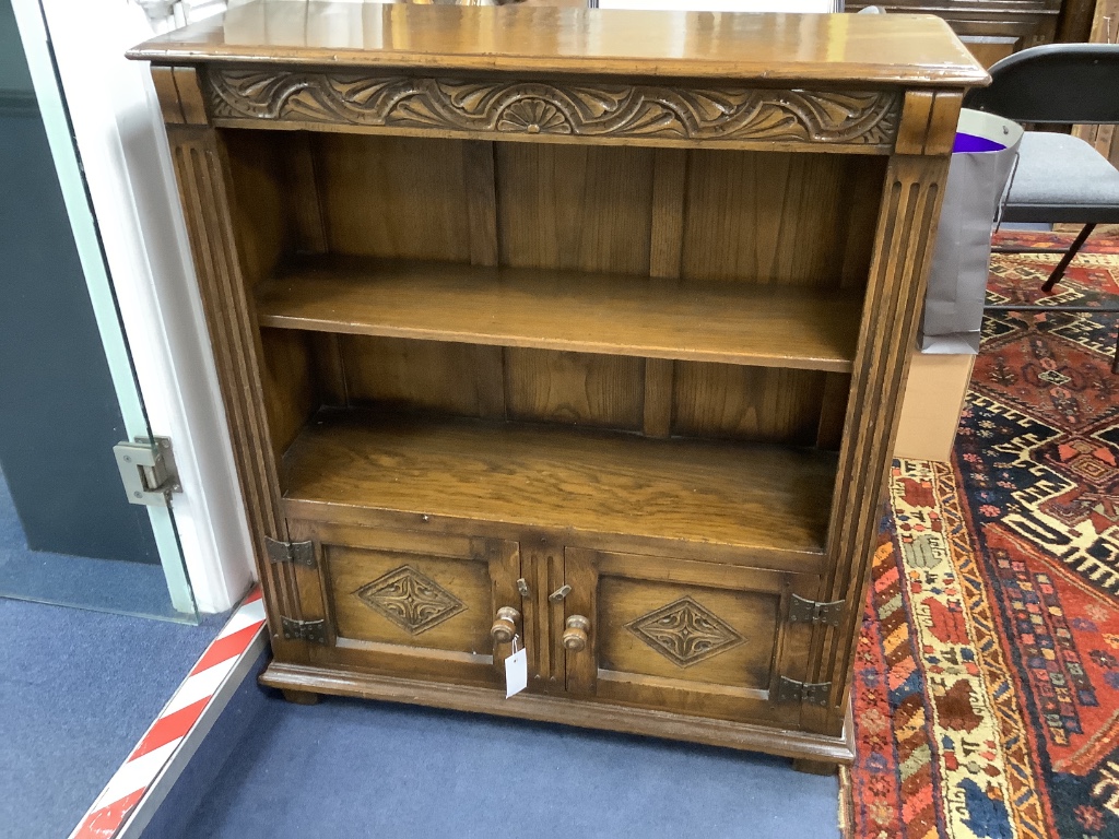 Two 18th century style oak side cabinets, larger width 84cm, depth 32cm, height 92cm